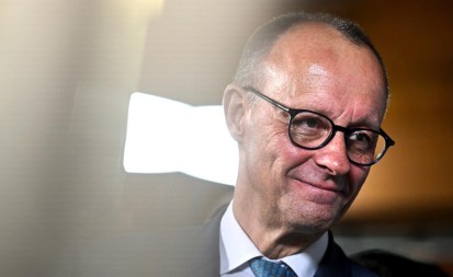 KANCELARU SAVJETOVANO DA BUDE UMILJAT Merc se na sastanku neće upuštati u prepirku sa američkim predsjednikom